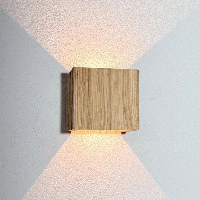 Lampada da parete in legno "WALDLICHT" frassino intagliato