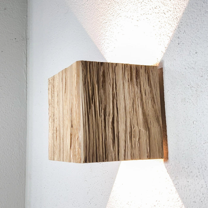 Lampada da parete in legno "WALDLICHT" frassino intagliato